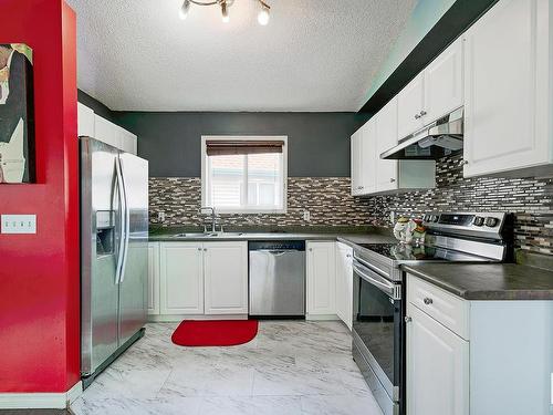 15037 135A St Nw, Edmonton, AB - Indoor Photo Showing Kitchen With Stainless Steel Kitchen With Double Sink With Upgraded Kitchen