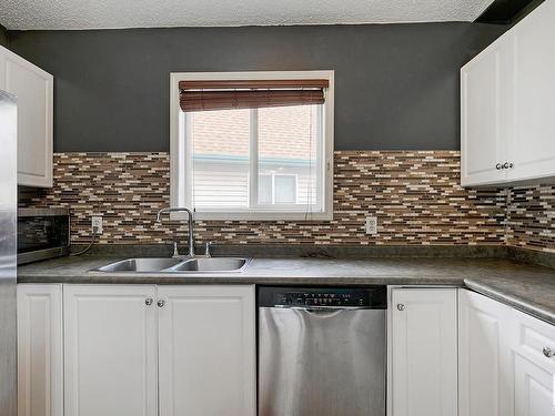 15037 135A St Nw, Edmonton, AB - Indoor Photo Showing Kitchen With Double Sink