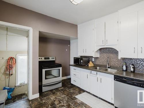 14706 103 Avenue, Edmonton, AB - Indoor Photo Showing Kitchen With Double Sink