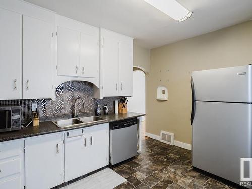 14706 103 Avenue, Edmonton, AB - Indoor Photo Showing Kitchen With Double Sink