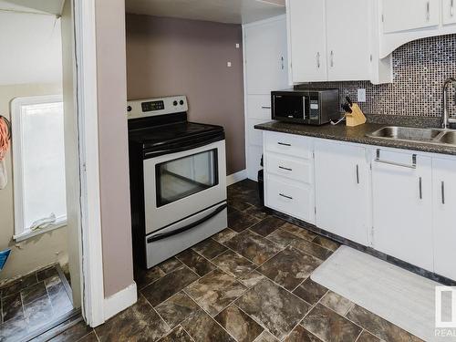 14706 103 Avenue, Edmonton, AB - Indoor Photo Showing Kitchen With Double Sink