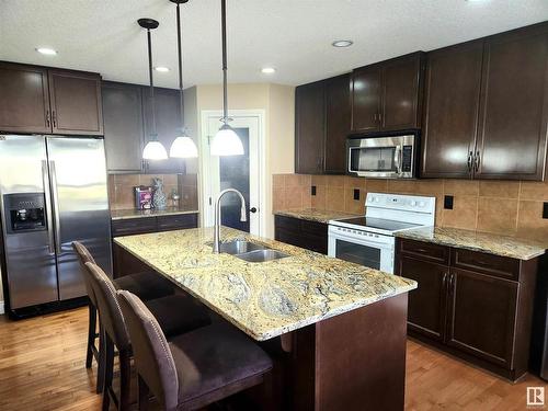 729 37A Avenue, Edmonton, AB - Indoor Photo Showing Kitchen With Double Sink With Upgraded Kitchen