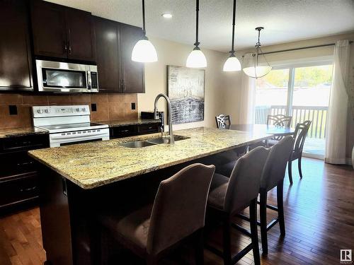 729 37A Avenue, Edmonton, AB - Indoor Photo Showing Kitchen With Double Sink