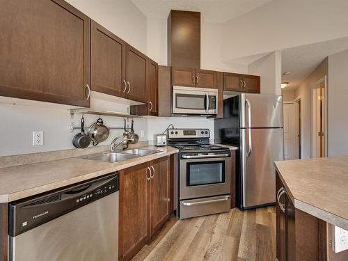 401 10710 116 Street, Edmonton, AB - Indoor Photo Showing Kitchen With Double Sink