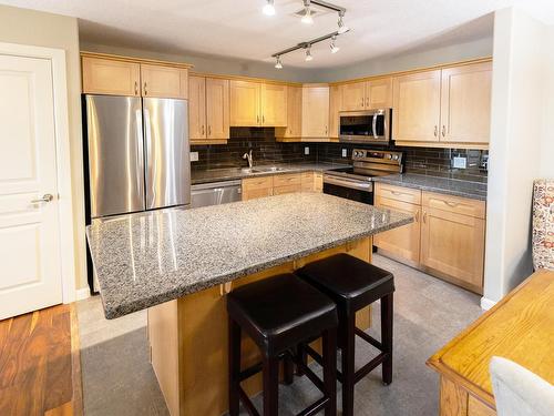 112 400 Palisades Way, Sherwood Park, AB - Indoor Photo Showing Kitchen With Stainless Steel Kitchen With Double Sink