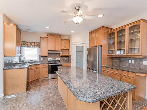 8603 11 Avenue, Edmonton, AB - Indoor Photo Showing Kitchen With Double Sink