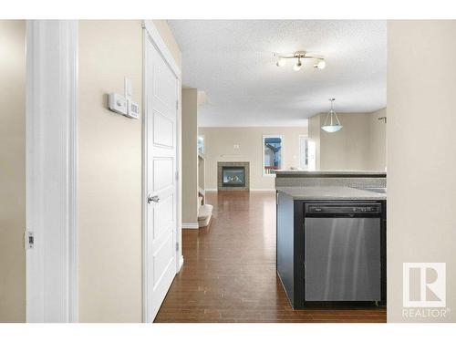 582 Tamarack Road, Edmonton, AB - Indoor Photo Showing Other Room With Fireplace