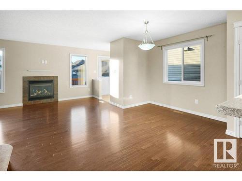 582 Tamarack Road, Edmonton, AB - Indoor Photo Showing Living Room With Fireplace