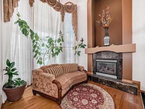 15907 91 Street, Edmonton, AB - Indoor Photo Showing Living Room With Fireplace