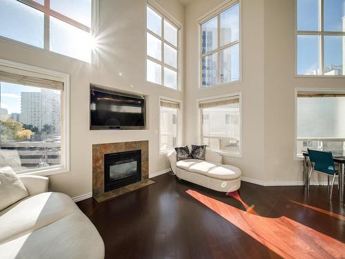 504 10033 116 Street, Edmonton, AB - Indoor Photo Showing Living Room With Fireplace