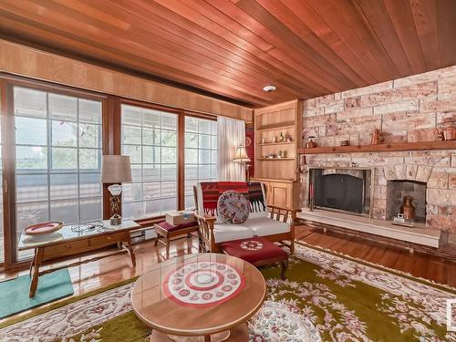 4422 Ada Boulevard, Edmonton, AB - Indoor Photo Showing Living Room With Fireplace