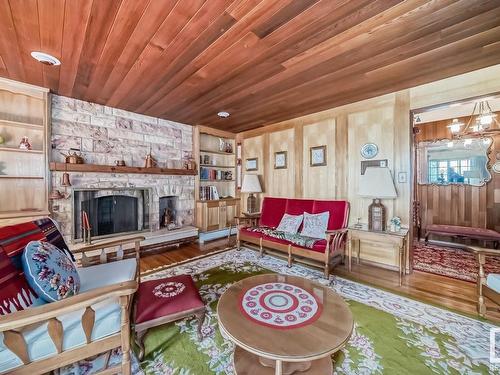 4422 Ada Boulevard, Edmonton, AB - Indoor Photo Showing Living Room With Fireplace