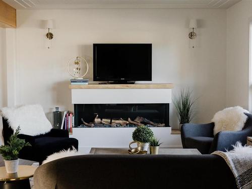 8803 145 Street, Edmonton, AB - Indoor Photo Showing Living Room With Fireplace