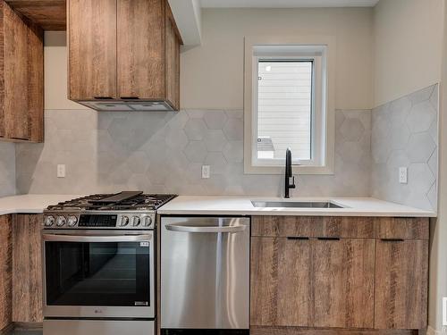 2503 Cameron Ravine Landing, Edmonton, AB - Indoor Photo Showing Kitchen With Upgraded Kitchen