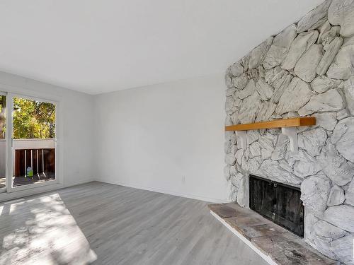 246 Lancaster Terrace, Edmonton, AB - Indoor Photo Showing Living Room With Fireplace