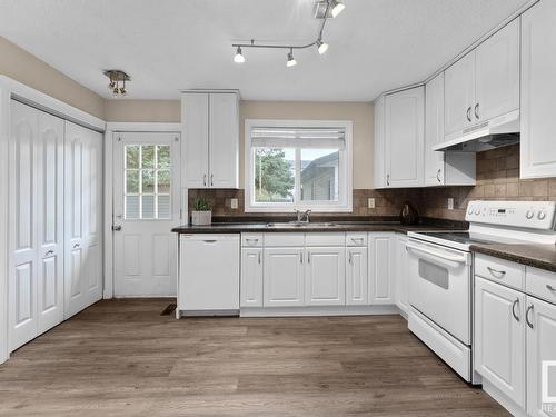 218 20 Street, Cold Lake, AB - Indoor Photo Showing Kitchen With Double Sink