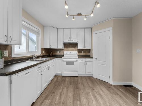 218 20 Street, Cold Lake, AB - Indoor Photo Showing Kitchen With Double Sink