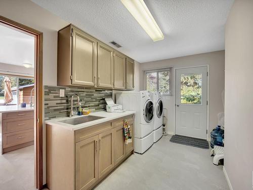 208 Grandisle Point(E) Nw, Edmonton, AB - Indoor Photo Showing Laundry Room