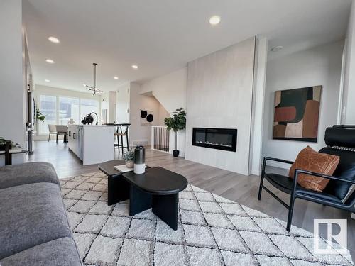 403 32 Street, Edmonton, AB - Indoor Photo Showing Living Room With Fireplace