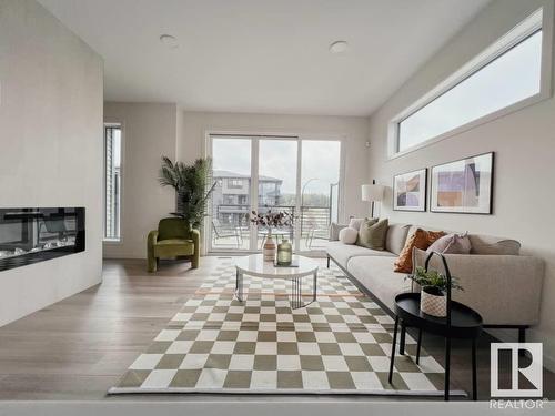 403 32 Street, Edmonton, AB - Indoor Photo Showing Living Room With Fireplace