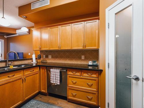 105 9707 106 Street, Edmonton, AB - Indoor Photo Showing Kitchen With Double Sink