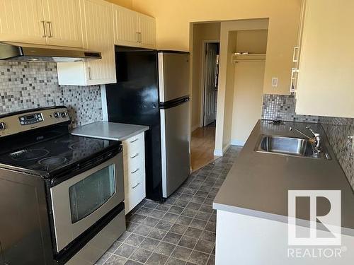 Edmonton, AB - Indoor Photo Showing Kitchen