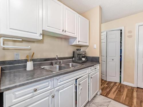 207 8930 149 Street, Edmonton, AB - Indoor Photo Showing Kitchen With Double Sink