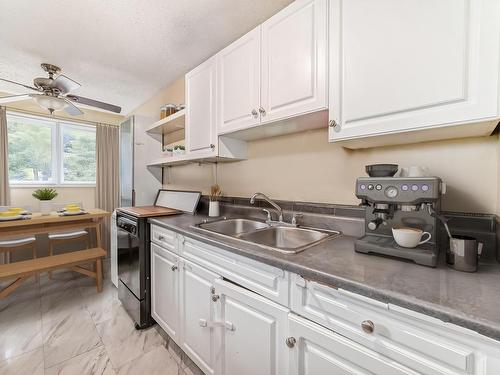 207 8930 149 Street, Edmonton, AB - Indoor Photo Showing Kitchen With Double Sink