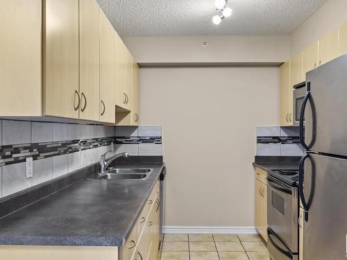 1405 10180 104 Street, Edmonton, AB - Indoor Photo Showing Kitchen With Double Sink