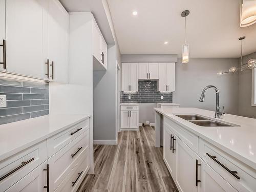 10238 92A Avenue, Morinville, AB - Indoor Photo Showing Kitchen With Double Sink With Upgraded Kitchen