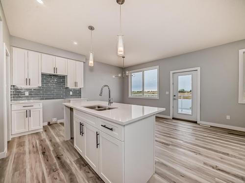 10238 92A Avenue, Morinville, AB - Indoor Photo Showing Kitchen With Double Sink With Upgraded Kitchen