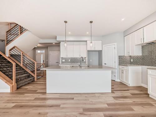 10214 92A Avenue, Morinville, AB - Indoor Photo Showing Kitchen With Upgraded Kitchen