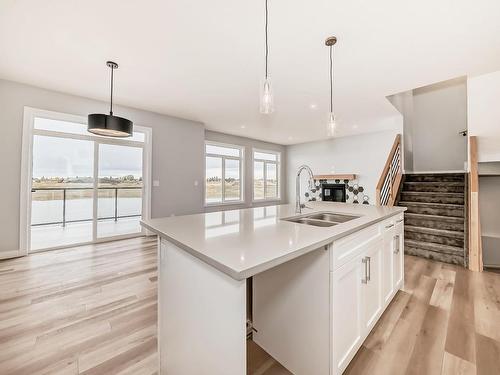 10214 92A Avenue, Morinville, AB - Indoor Photo Showing Kitchen With Double Sink