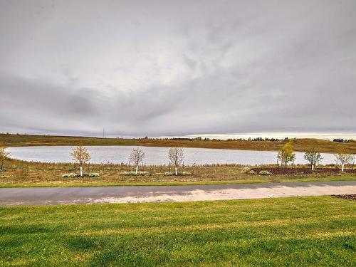 10214 92A Avenue, Morinville, AB - Outdoor With Body Of Water With View