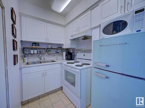 216 8802 Southfort Drive, Fort Saskatchewan, AB - Indoor Photo Showing Kitchen