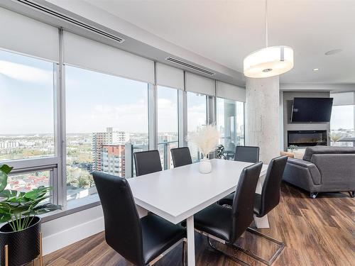 1701 11969 Jasper Avenue, Edmonton, AB - Indoor Photo Showing Dining Room With Fireplace