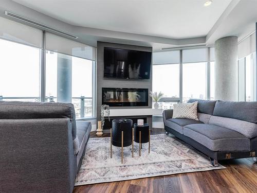 1701 11969 Jasper Avenue, Edmonton, AB - Indoor Photo Showing Living Room With Fireplace