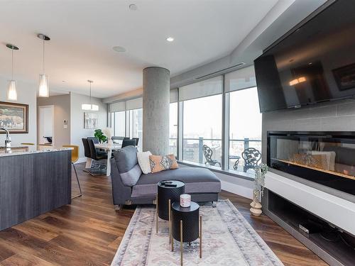 1701 11969 Jasper Avenue, Edmonton, AB - Indoor Photo Showing Living Room With Fireplace