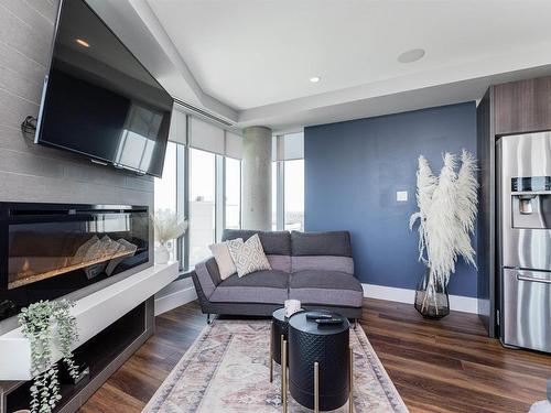 1701 11969 Jasper Avenue, Edmonton, AB - Indoor Photo Showing Living Room With Fireplace