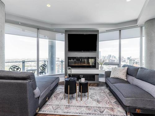 1701 11969 Jasper Avenue, Edmonton, AB - Indoor Photo Showing Living Room With Fireplace