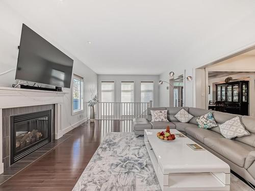 3503 Goodridge Bay Nw, Edmonton, AB - Indoor Photo Showing Living Room With Fireplace