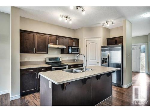 11620 17 Avenue, Edmonton, AB - Indoor Photo Showing Kitchen With Double Sink