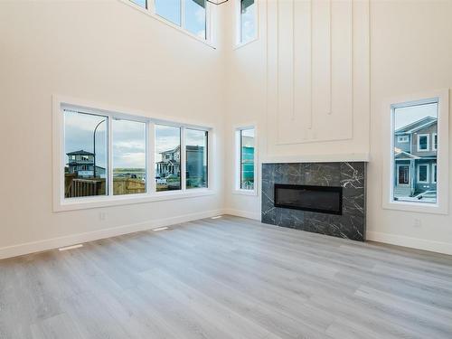 54 Prescott Boulevard, Spruce Grove, AB - Indoor Photo Showing Living Room With Fireplace