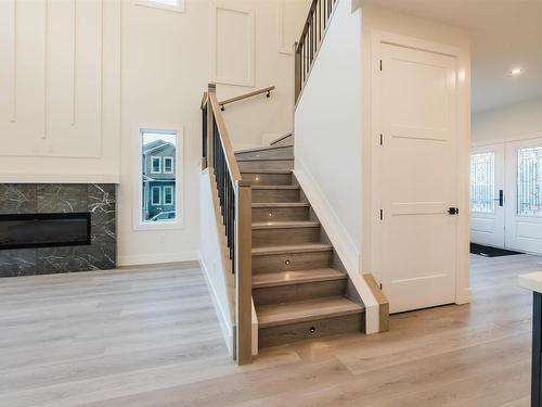 54 Prescott Boulevard, Spruce Grove, AB - Indoor Photo Showing Other Room With Fireplace