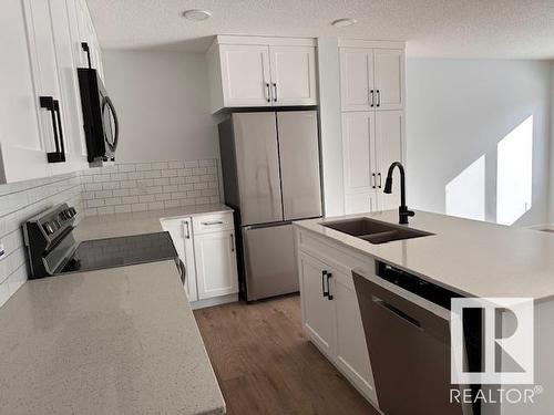 5 13119 209 Street Nw, Edmonton, AB - Indoor Photo Showing Kitchen With Double Sink