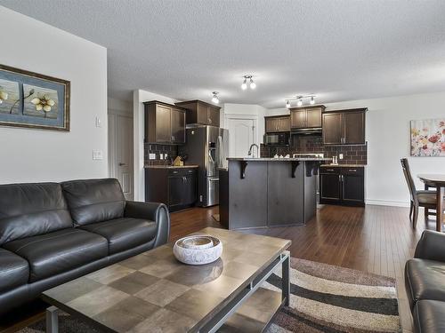 6111 10 Avenue, Edmonton, AB - Indoor Photo Showing Living Room