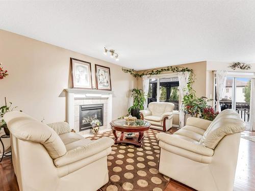 2012 33A Avenue, Edmonton, AB - Indoor Photo Showing Living Room With Fireplace