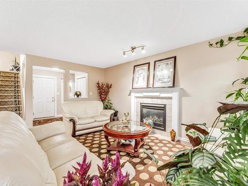 2012 33A Avenue, Edmonton, AB - Indoor Photo Showing Living Room With Fireplace