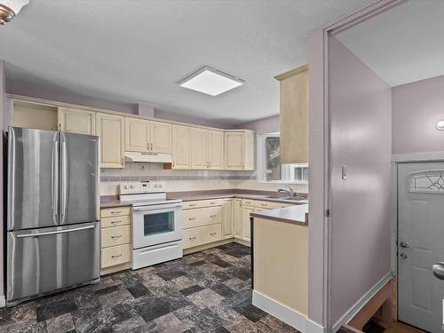 7821 154 Street, Edmonton, AB - Indoor Photo Showing Kitchen With Double Sink