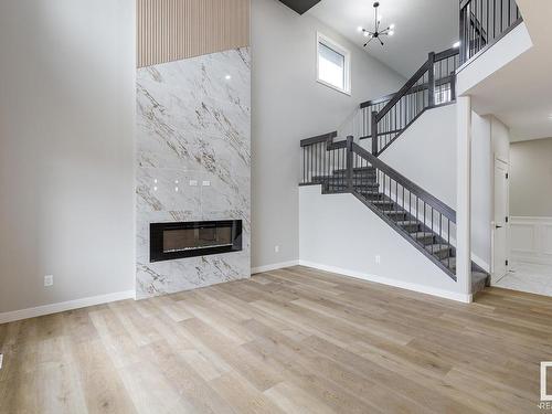 516 Merlin Landing Landing, Edmonton, AB - Indoor Photo Showing Living Room With Fireplace